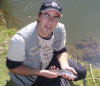 Gareth Roocroft with a Rainbow Trout fingerling