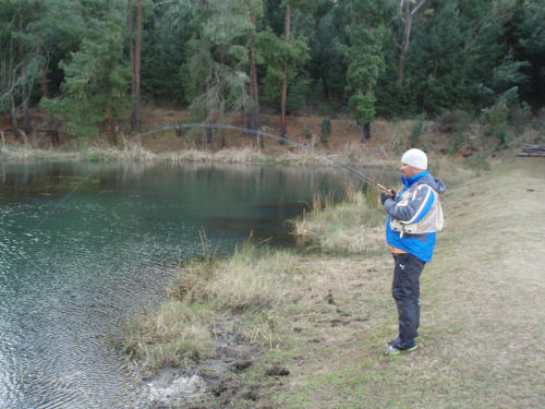 Rodney Smit fighting a big Rainbow Trout