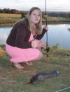 Aimee Harvey with a barbel caught on a curly tail