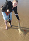 Aimee Harvey with a small Lesser Sandshark