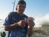 Jason Mcintosh with a juvenile Blacktail