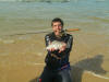 Gareth with a Steenbras on 5lb line in the surf