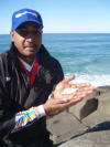 Kumz Naidoo with a Pinky caught on a 4/0 hook