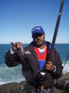 Kumesh Naidoo with a Pinky caught on a sibiki rig